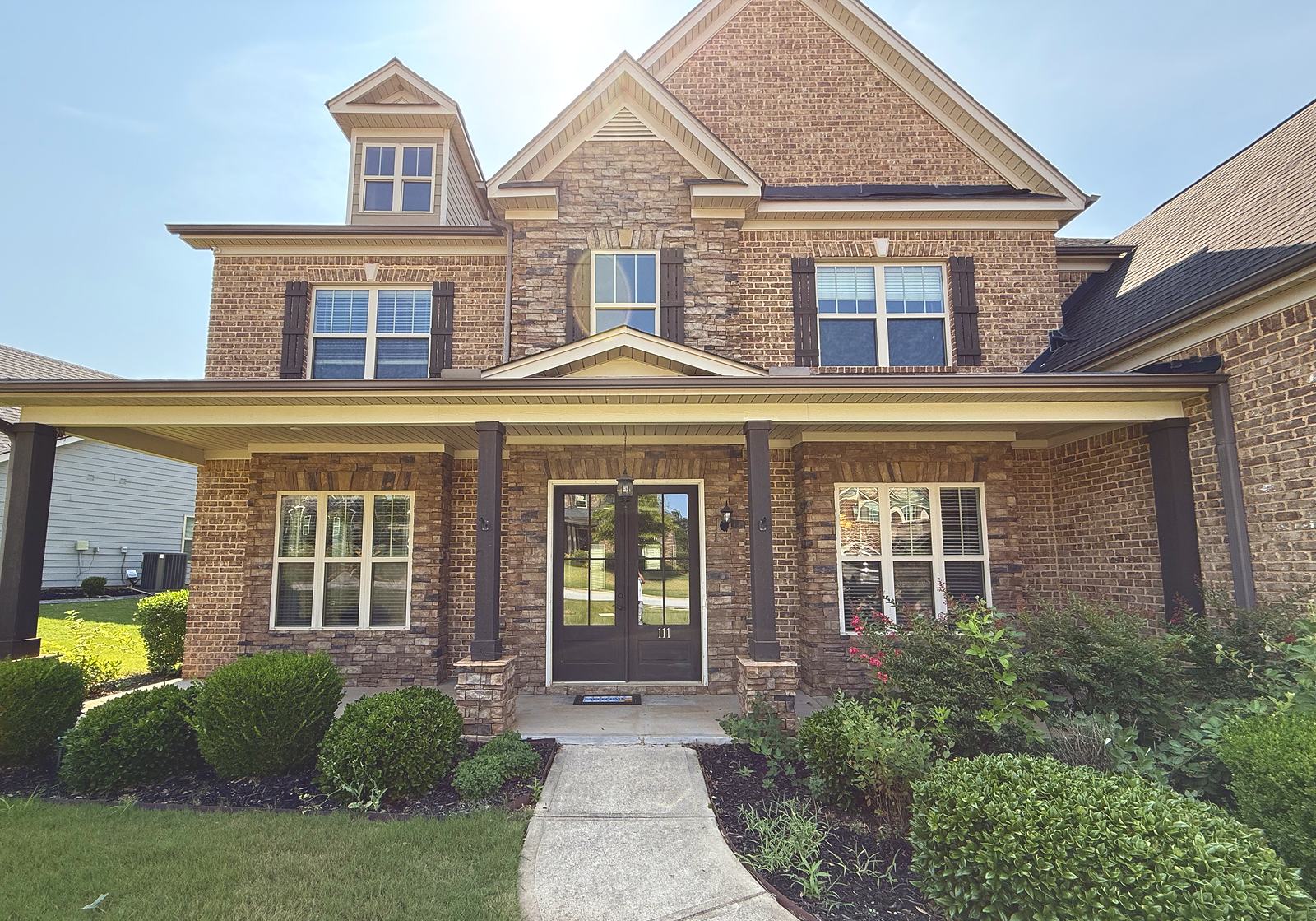 Brick home exterior painting by Verdeja Painting, serving Five Forks SC and Greenville
