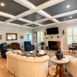 Living room coffered ceiling painted dark charcoal with white beams by Verdeja Painting in Greenville, SC